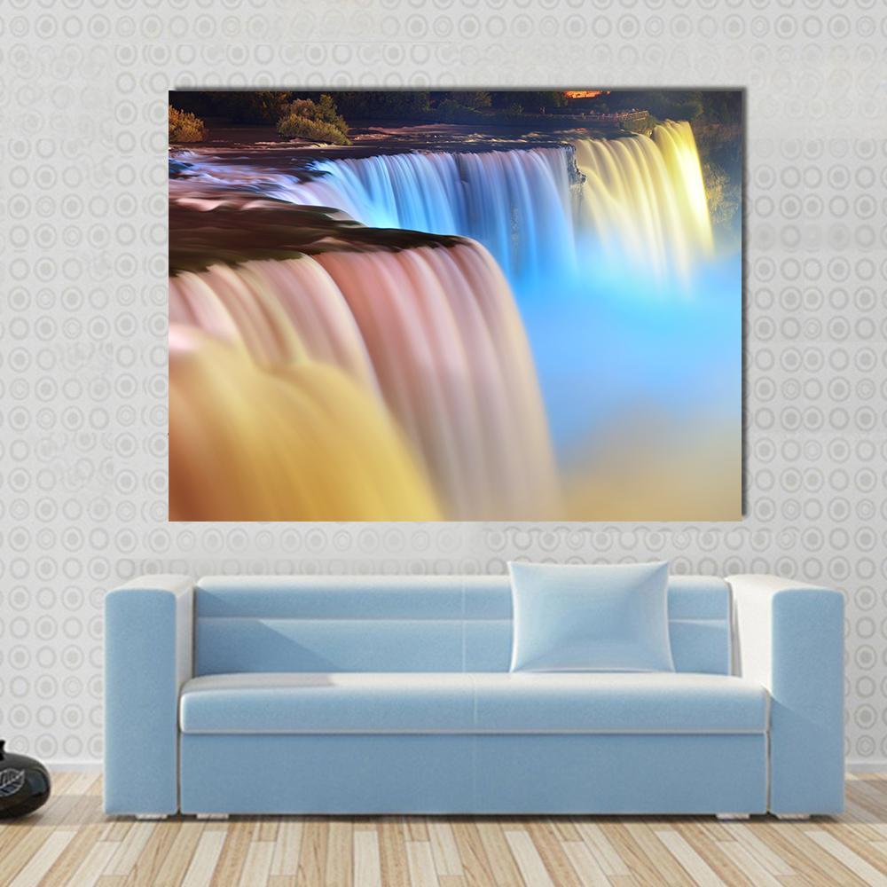 Colorful Niagara Falls Canvas Wall Art in yellow, blue and multicolor, single panel hung on a wall