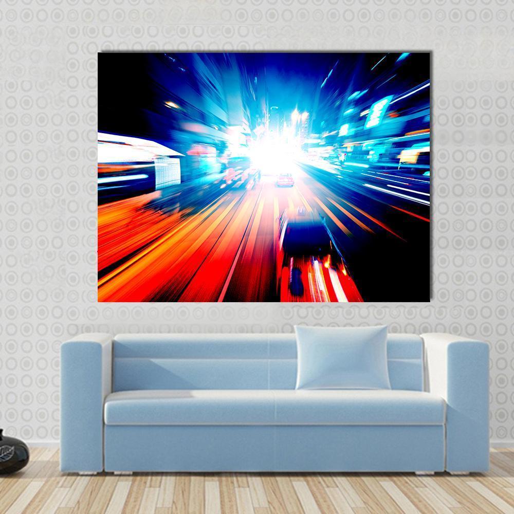 Colorful Night Traffic Canvas Wall Art in red, orange and blue, single panel hung on a wall