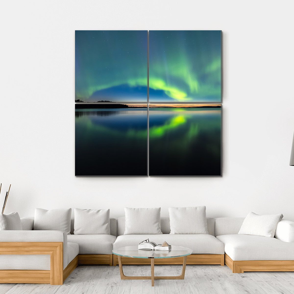 Northern Lights Over Still Lake Canvas Wall Art in black, green and blue, hung on a wall
