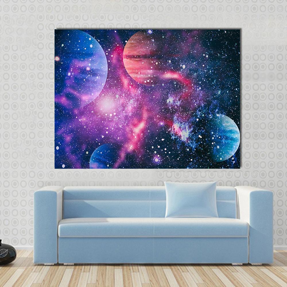 Colorful Planet Illustration Canvas Wall Art in blue, purple and pink, single panel hung on a wall
