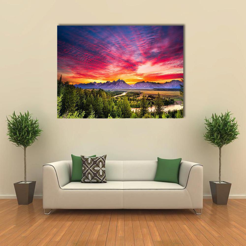 Colorful Sunset at Snake River Canvas Wall Art in orange, blue and pink, single panel hung on a wall