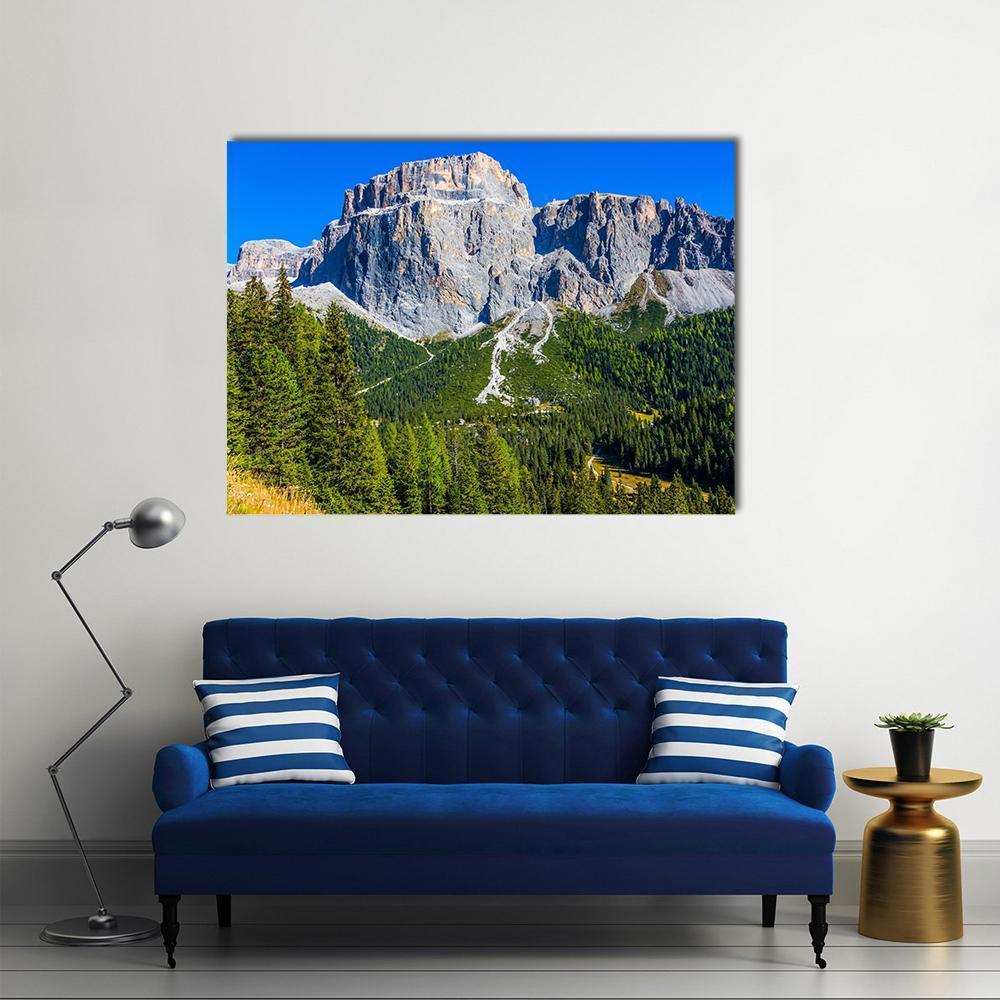 Colossal White Rocks Canvas Wall Art in gray, green and blue, single panel hung on a wall
