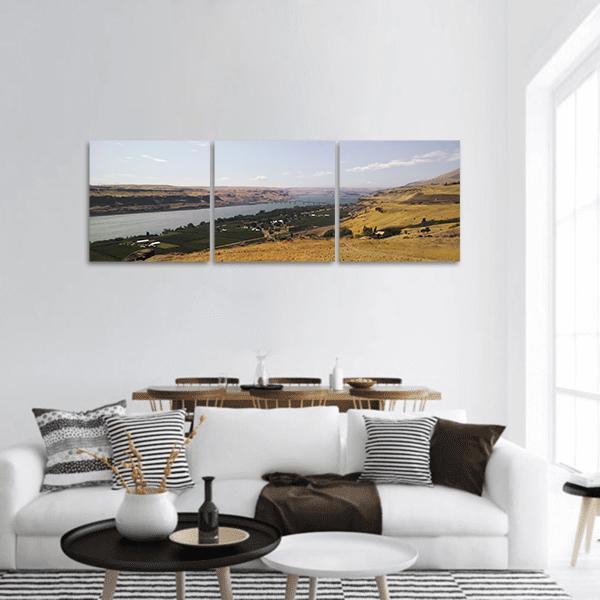 Columbia Gorge River View Panoramic Canvas Wall Art in brown, yellow and blue, hung on a wall