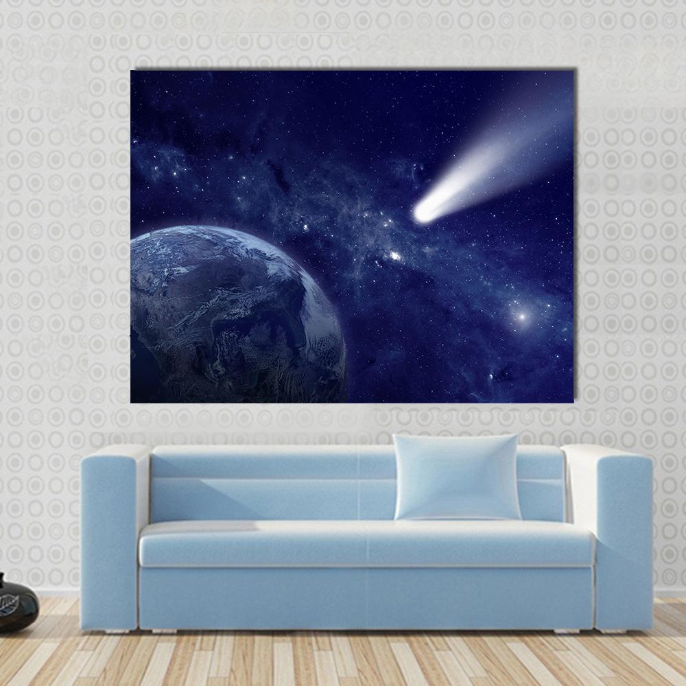Comet Approaching Planet Canvas Wall Art in black, white and blue, single panel hung on a wall