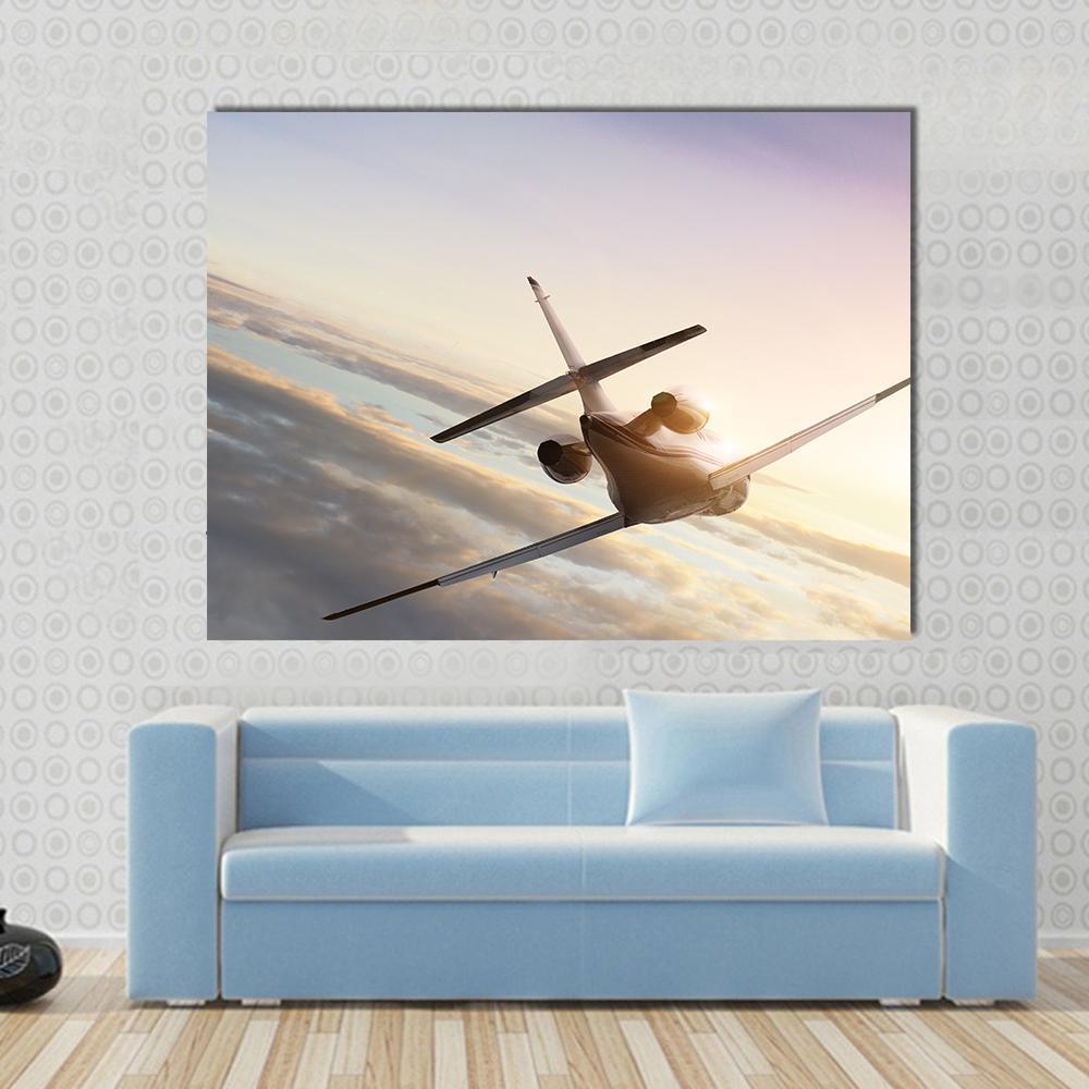 Commercial Airplane in Sky Canvas Wall Art in white, beige and blue, single panel hung on a wall