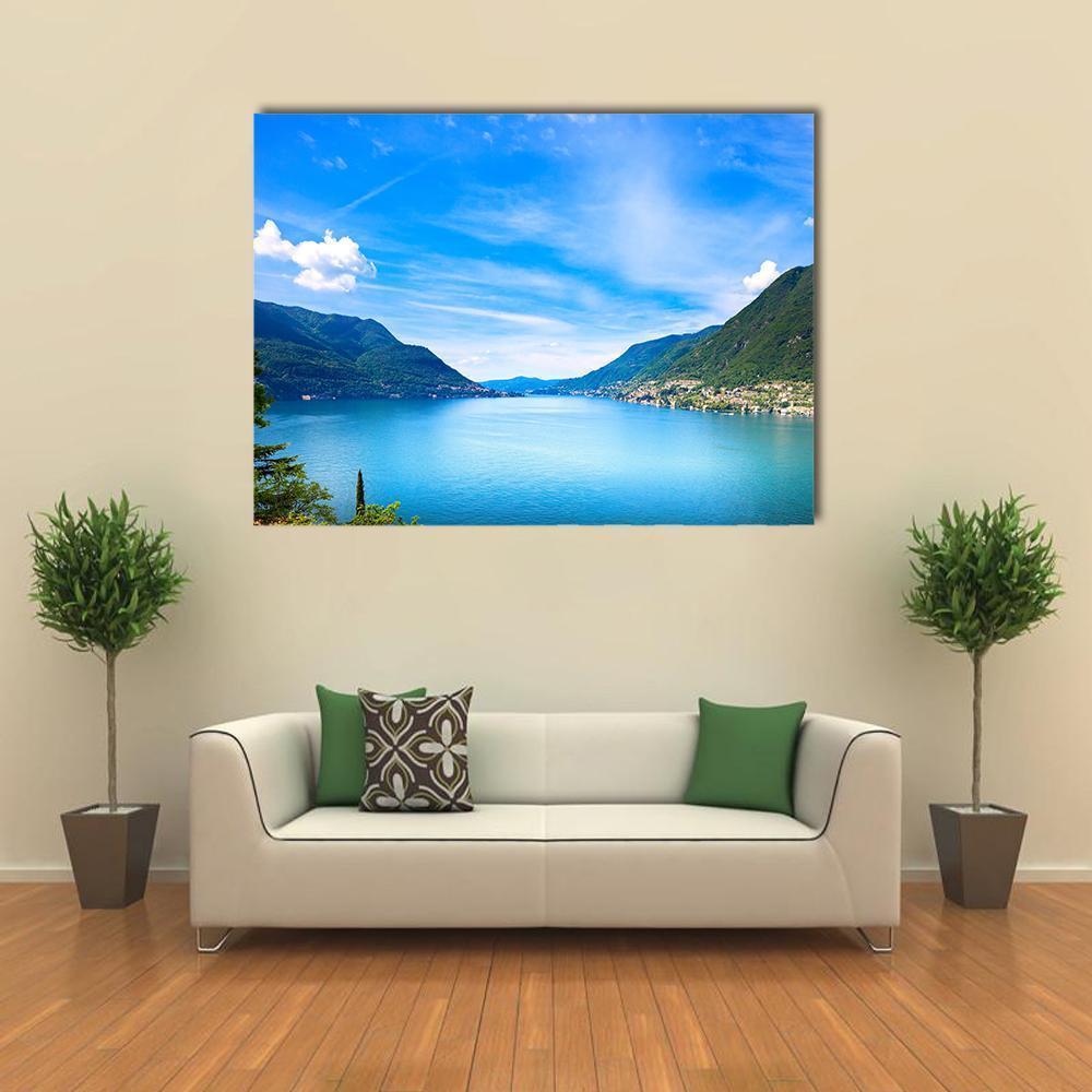 Como Lake Landscape Canvas Wall Art in green and blue, single panel hung on a wall