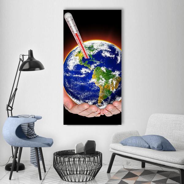 Hands Cradling Earth with Thermometer Vertical Canvas Wall Art in black, green and blue, single vertical panel hung on a wall