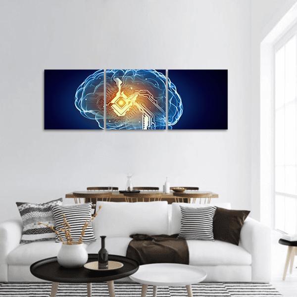 Human Brain with Microchip Panoramic Canvas Wall Art in black, orange and blue, hung on a wall