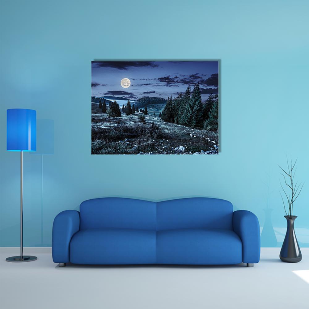 Moonlit Coniferous Forest Canvas Wall Art in black, gray and blue, single panel hung on a wall