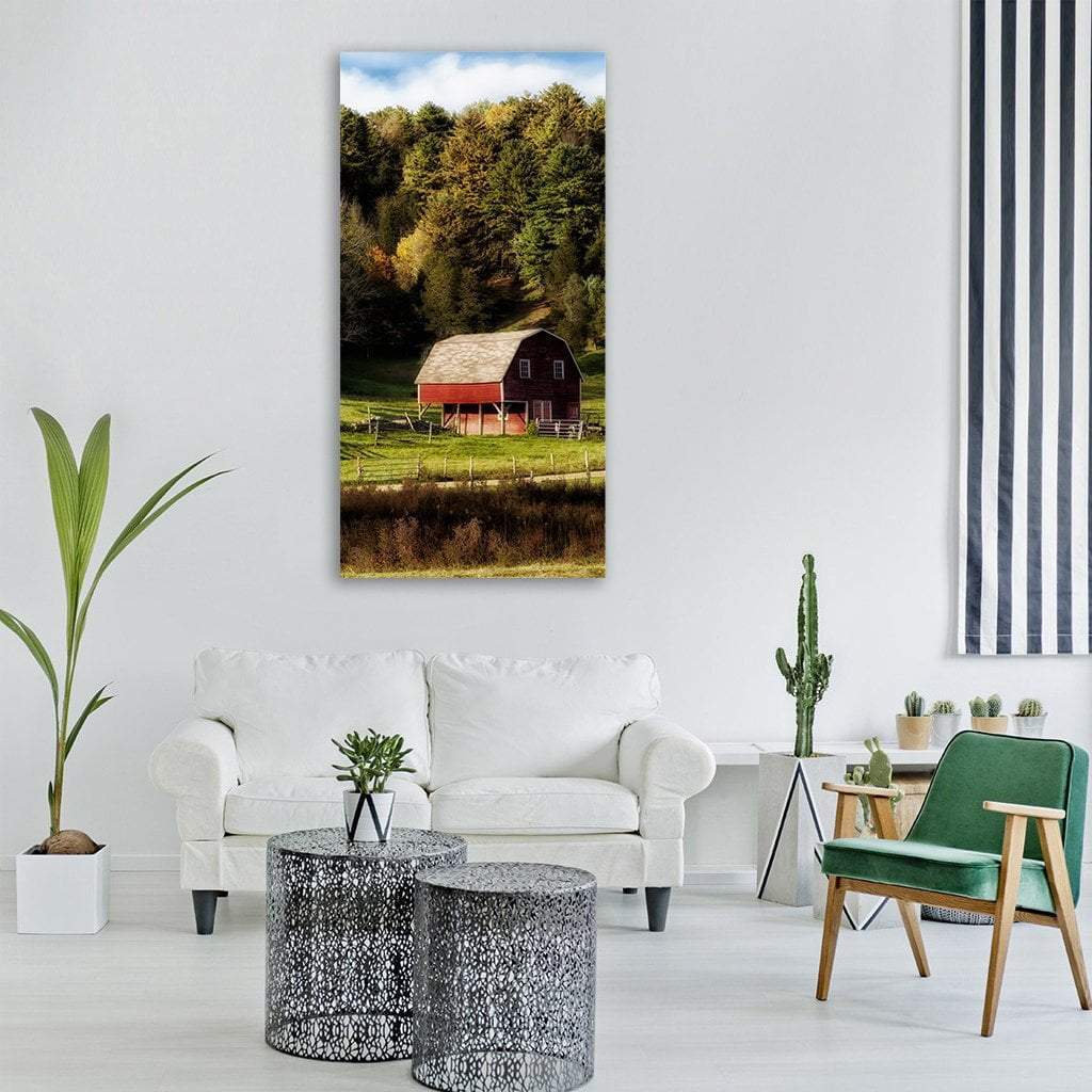 Connecticut Red Barn Landscape Vertical Canvas Wall Art in brown, red and green, single vertical panel hung on a wall