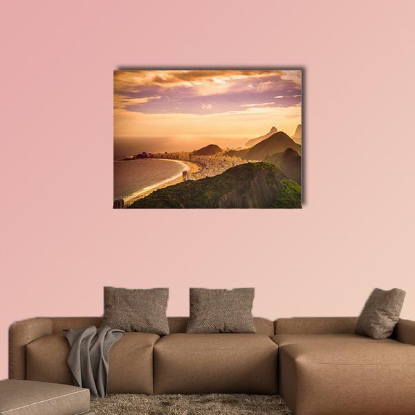 Copacabana Beach at Dusk Canvas Wall Art in orange, yellow and green, single panel hung on a wall