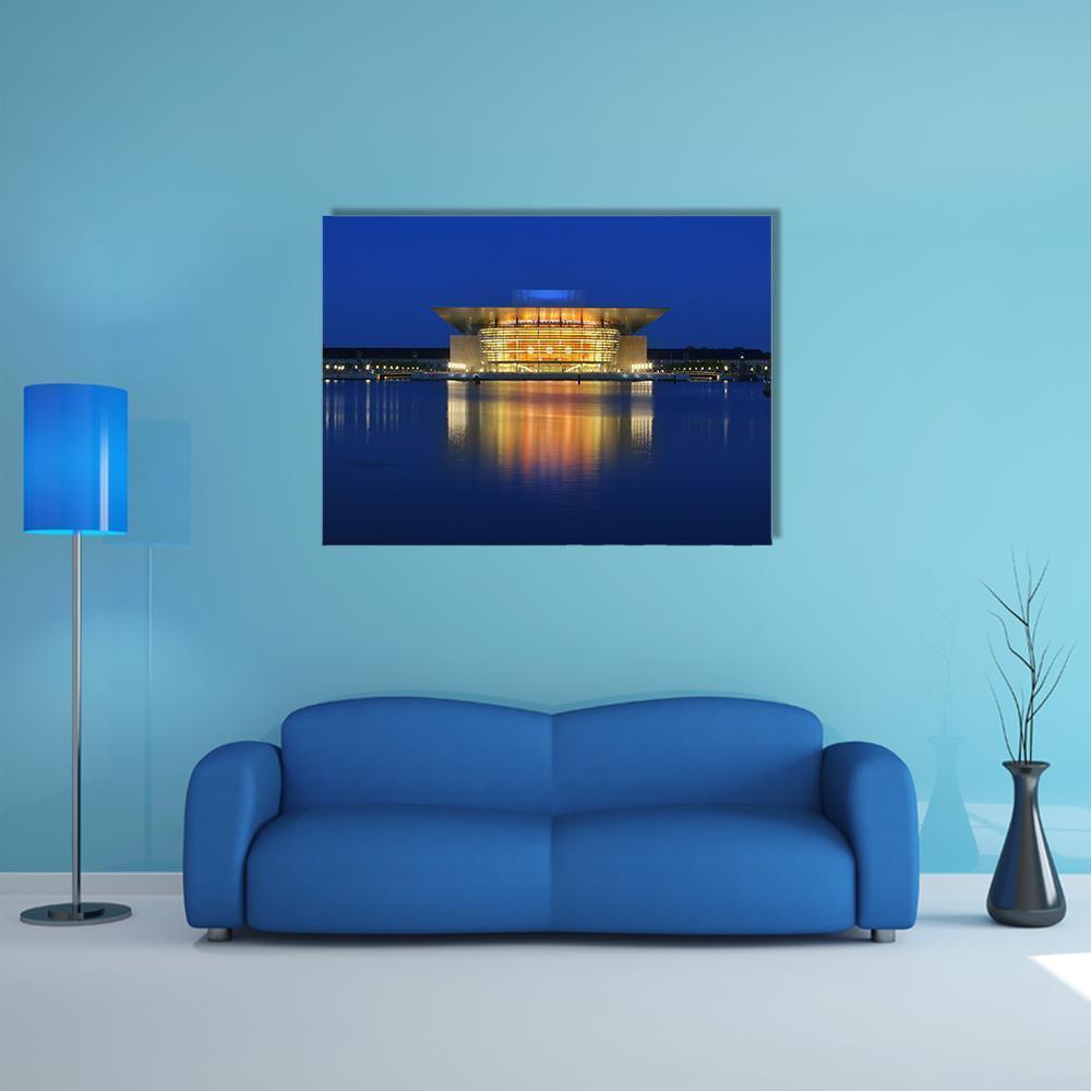Copenhagen Opera House at Night Canvas Wall Art in gold, yellow and blue, single panel hung on a wall