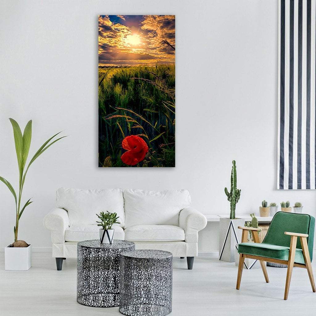 Poppy in Green Wheat Field at Sunset Vertical Canvas Wall Art in orange, yellow and green, single vertical panel hung on a wall