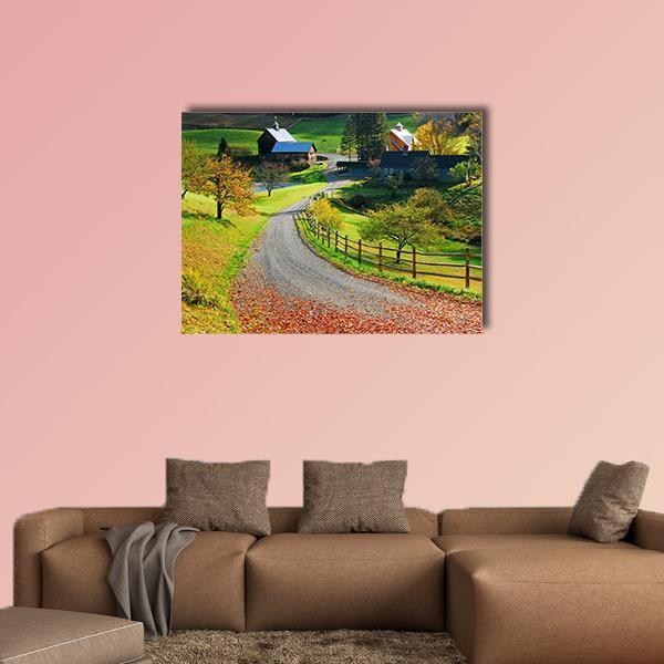 Country Road Farmhouse in Autumn Canvas Wall Art in brown, yellow and green, single panel hung on a wall