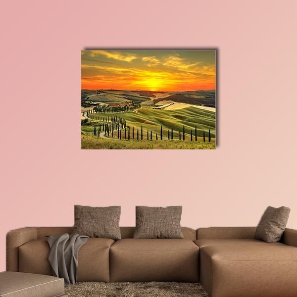 Italian Countryside Farm at Sunset Canvas Wall Art in orange, yellow and green, single panel hung on a wall