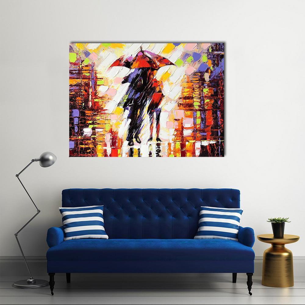 Couple Under an Umbrella Canvas Wall Art in red, yellow and multicolor, single panel hung on a wall