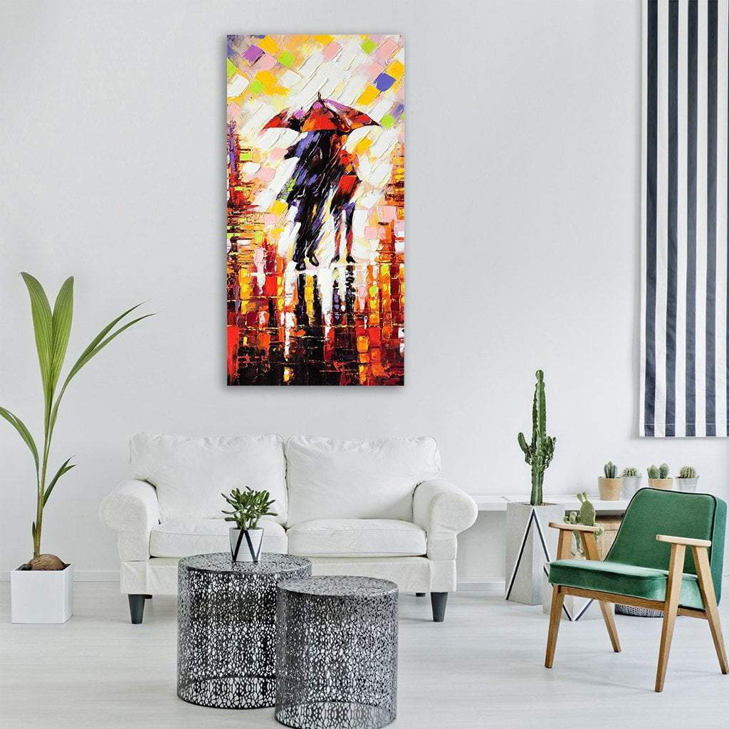 Couple Under a Red Umbrella on Rainy Street Vertical Canvas Wall Art in red, yellow and multicolor, single vertical panel hung on a wall