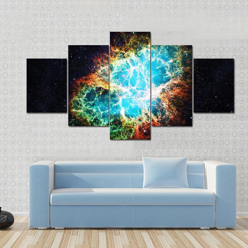 Crab Nebula Canvas Wall Art in black, orange and blue, 5 panel Star layout hung on a wall