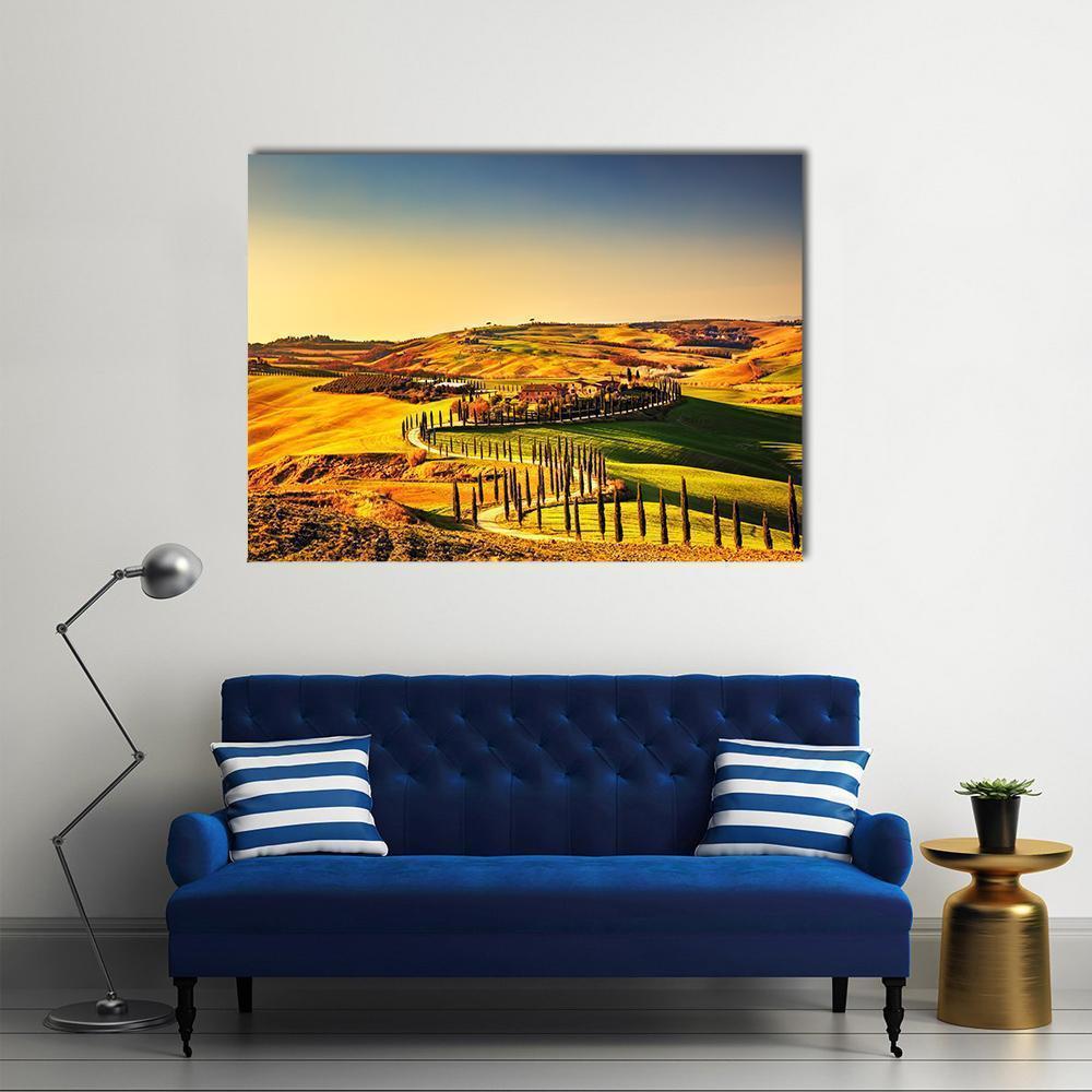 Crete Senesi Tuscany Rolling Hills at Golden Hour Canvas Wall Art in gold, yellow and green, single panel hung on a wall