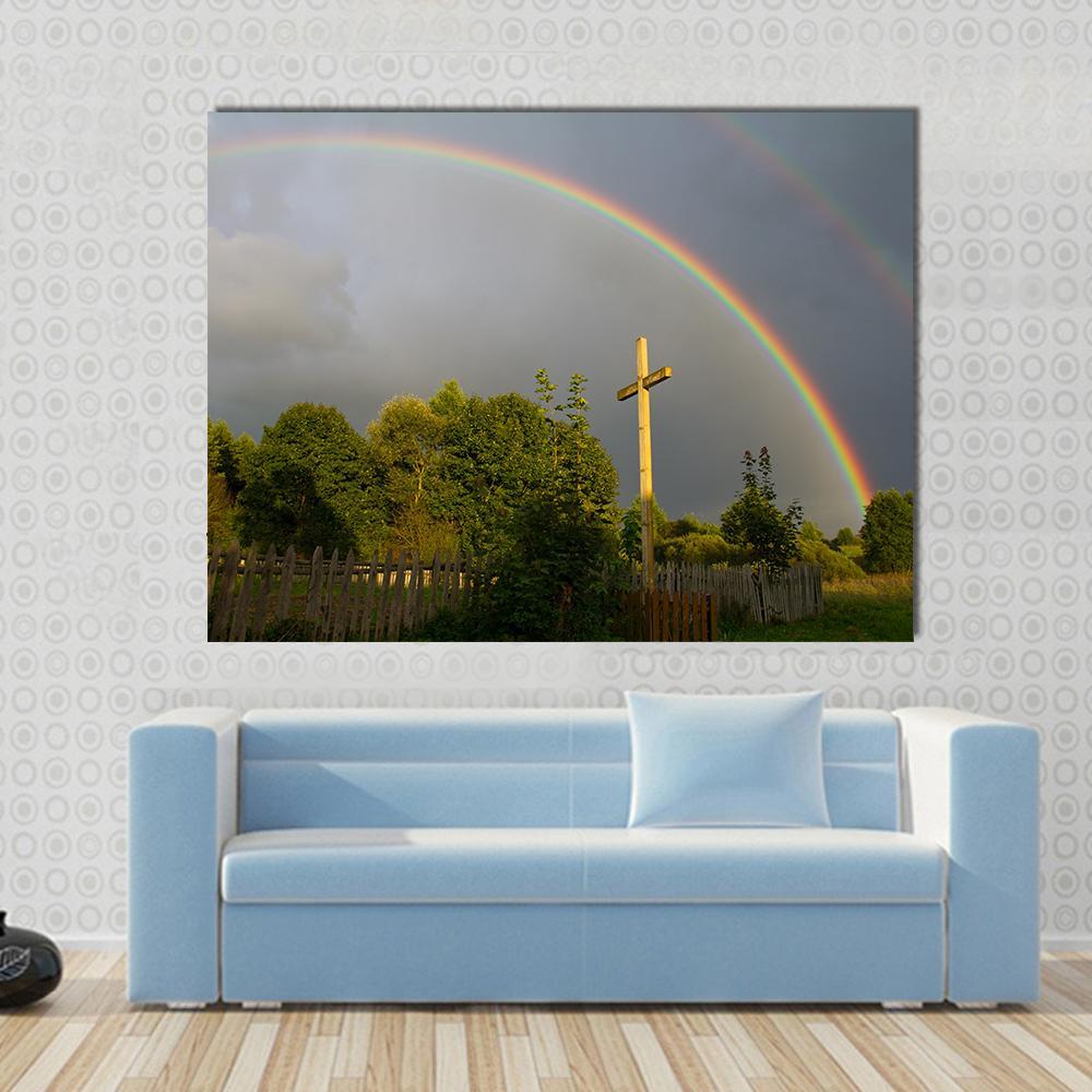 Cross and Rainbow Canvas Wall Art in gray, green and multicolor, single panel hung on a wall