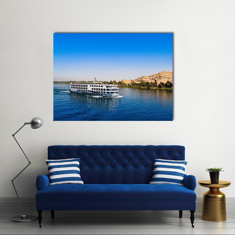 River Cruise on the Nile Canvas Wall Art in brown and blue, single panel hung on a wall