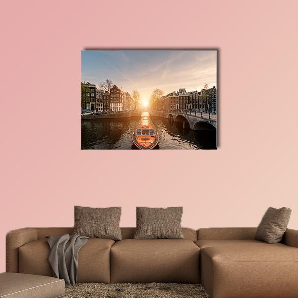 Cruise Ship on Amsterdam Canal Canvas Wall Art in brown, orange and blue, single panel hung on a wall