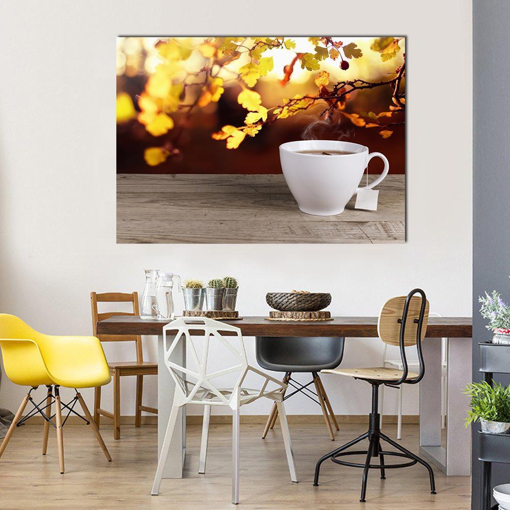 Cup of Tea Canvas Wall Art in white, brown and yellow, single panel hung on a wall