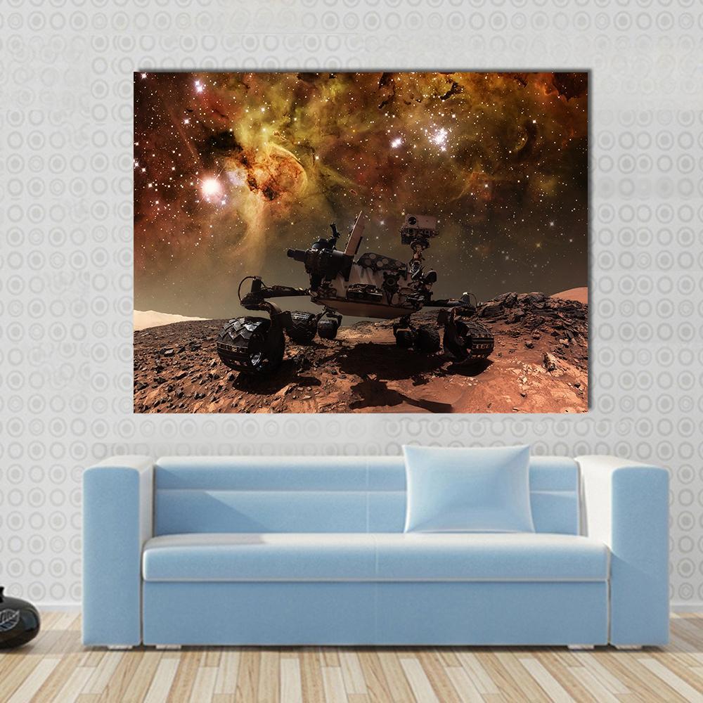 Curiosity Rover on Mars Canvas Wall Art in brown, orange and yellow, single panel hung on a wall