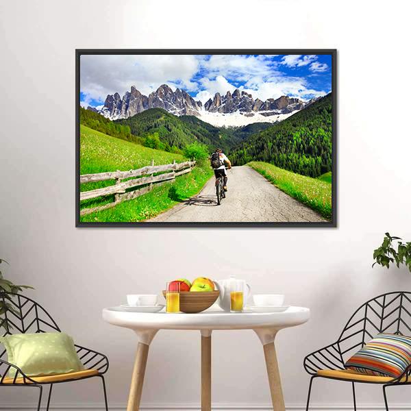 Cyclist on Mountain Road Canvas Wall Art in gray, green and blue, framed canvas, product view on a white background
