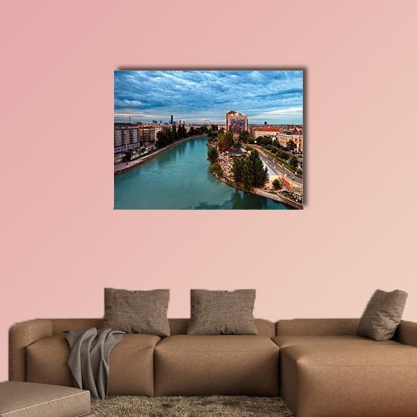 Herrmann Beach Cityscape with River Canvas Wall Art in gray, brown and blue, single panel hung on a wall