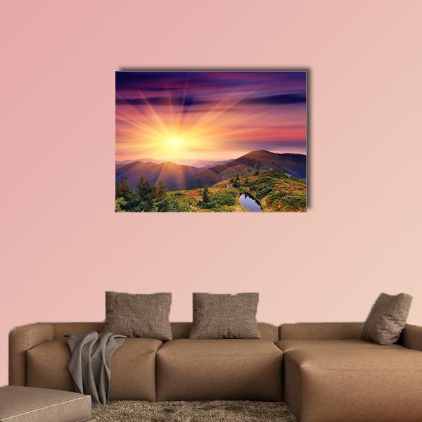 Dawn Over Mountain Lake Canvas Wall Art in orange, yellow and purple, single panel hung on a wall