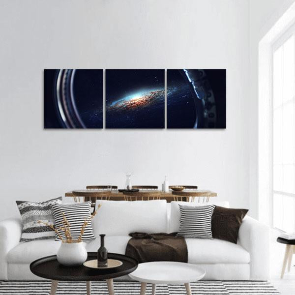 Spaceship Porthole View of Spiral Galaxy Panoramic Canvas Wall Art in black, blue and navy, hung on a wall