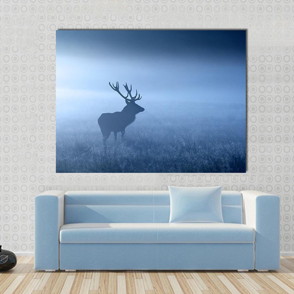 Deer in Fog Canvas Wall Art in white and blue, single panel hung on a wall