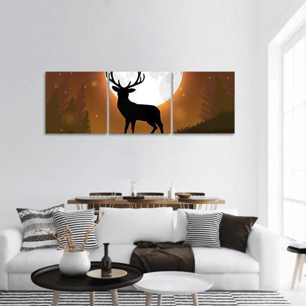 Stag Silhouette on Moonlit Hill Panoramic Canvas Wall Art in black, brown and orange, hung on a wall
