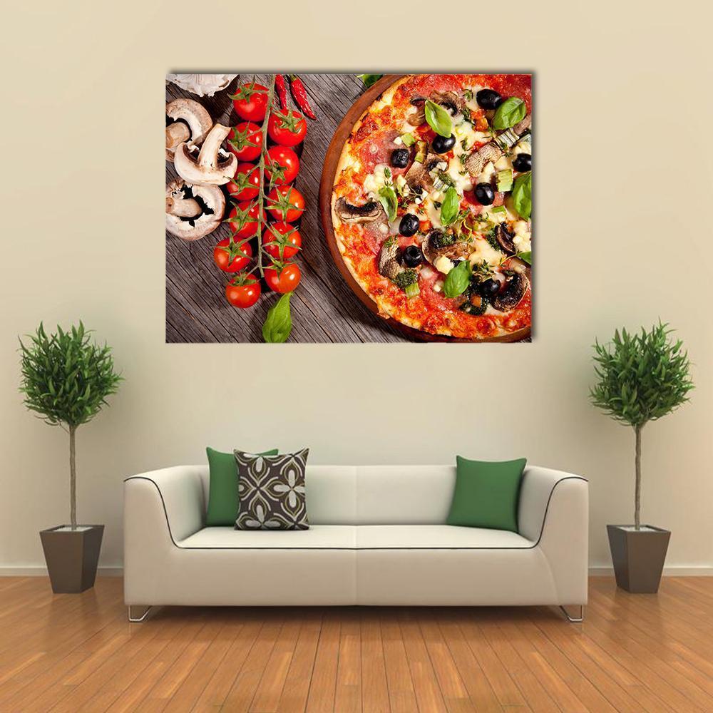 Fresh Pizza with Tomatoes and Basil Canvas Wall Art in brown, red and yellow, single panel hung on a wall