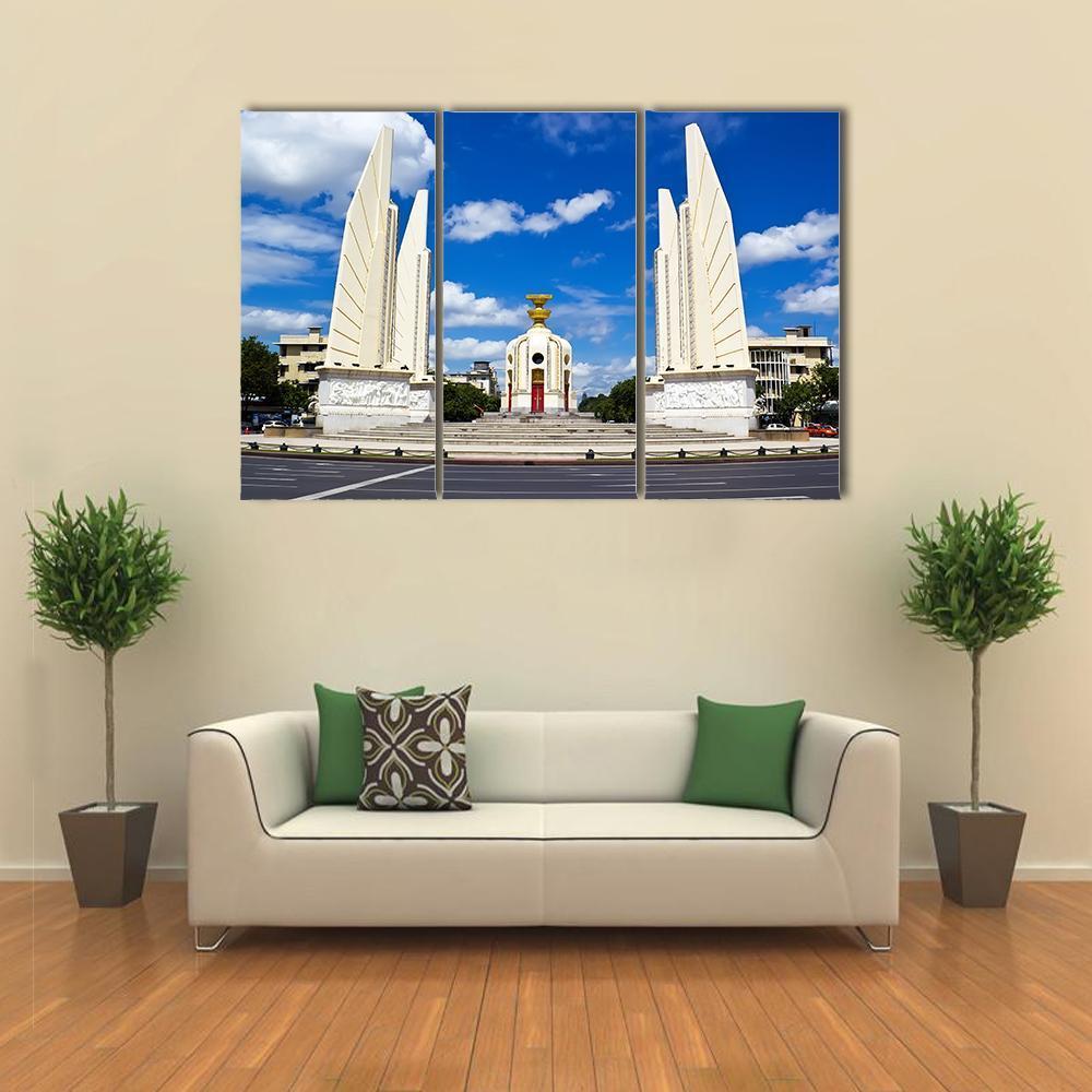 Democracy Monument Bangkok Canvas Wall Art in white and blue, 3 panel horizontal set hung on a wall