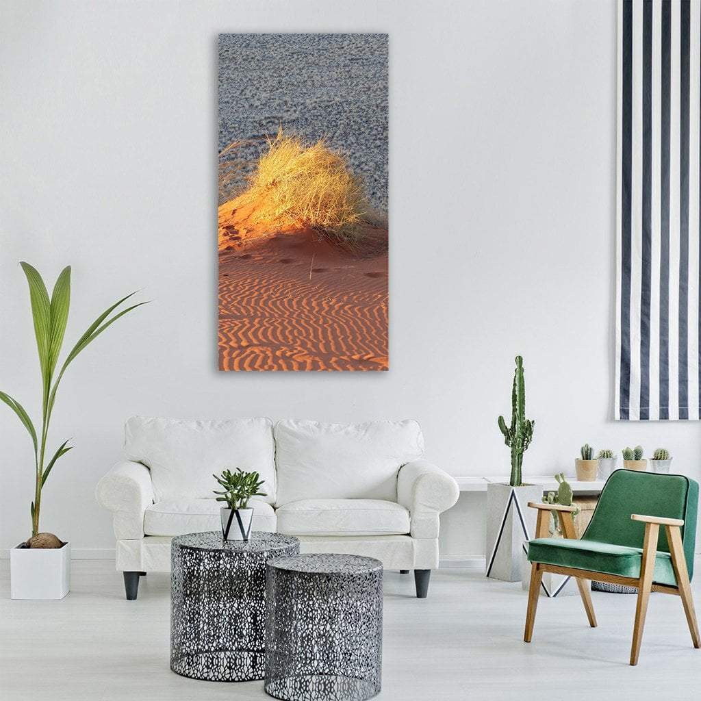Desert Dunes at Golden Hour Vertical Canvas Wall Art in gray, orange and yellow, single vertical panel hung on a wall