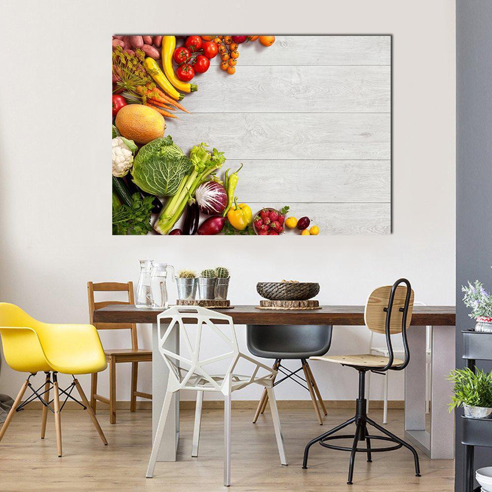 Colorful Fruits and Fresh Vegetables Canvas Wall Art in white, green and multicolor, single panel hung on a wall