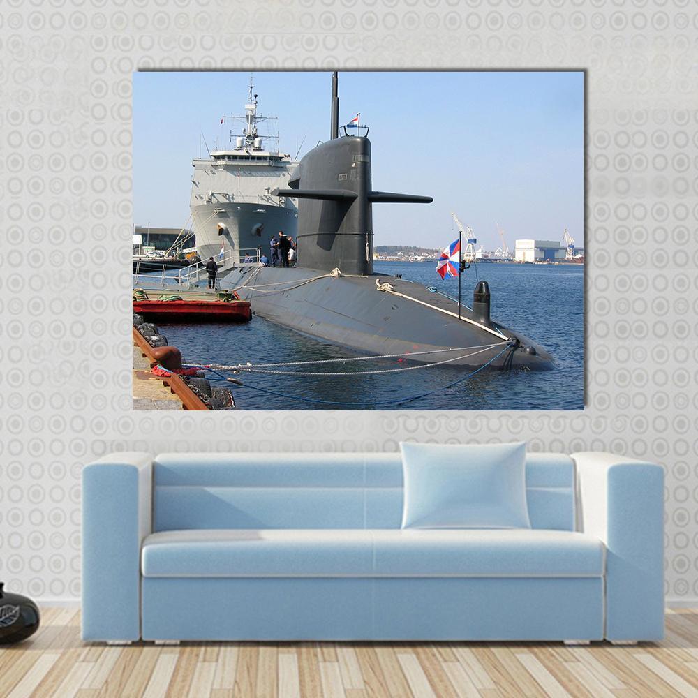 Docked Submarine Canvas Wall Art in black, gray and blue, single panel hung on a wall