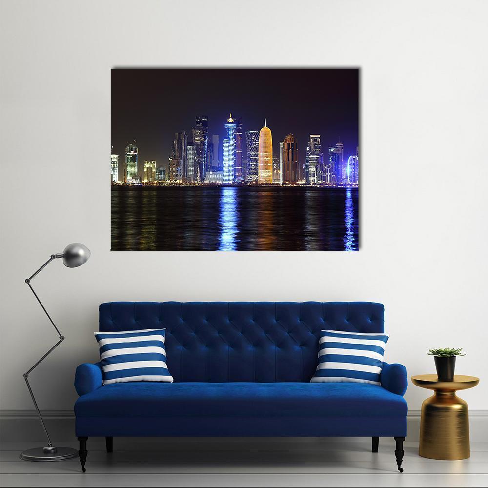Doha Night Skyline Canvas Wall Art in black, gold and blue, single panel hung on a wall