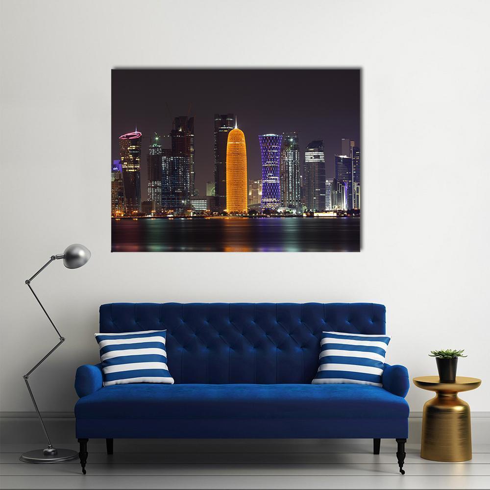 Doha Night Skyline Canvas Wall Art in black, gold and blue, single panel hung on a wall