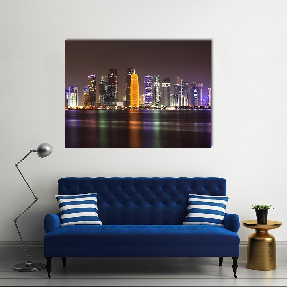 Doha Skyline at Night Canvas Wall Art in black, gold and purple, single panel hung on a wall