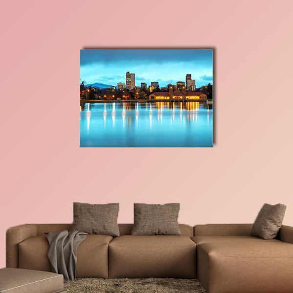 Downtown Denver Night Skyline Reflection Canvas Wall Art in black, yellow and blue, single panel hung on a wall