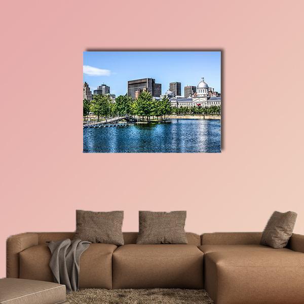 Lakeside City Skyline with Dome Reflection Canvas Wall Art in gray, green and blue, single panel hung on a wall