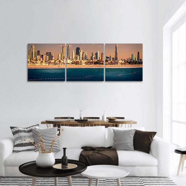 Dubai Downtown Skyline and Beach Panoramic Canvas Wall Art in beige, gold and blue, hung on a wall