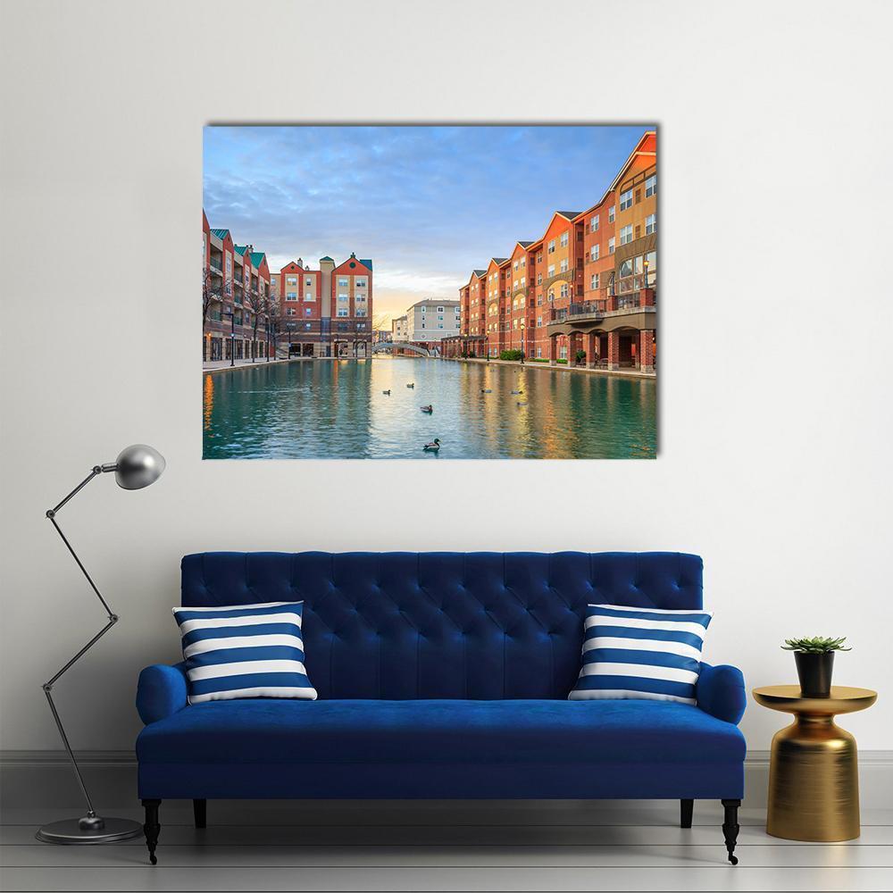 Sunset Canal Cityscape with Ducks Canvas Wall Art in brown, orange and blue, single panel hung on a wall