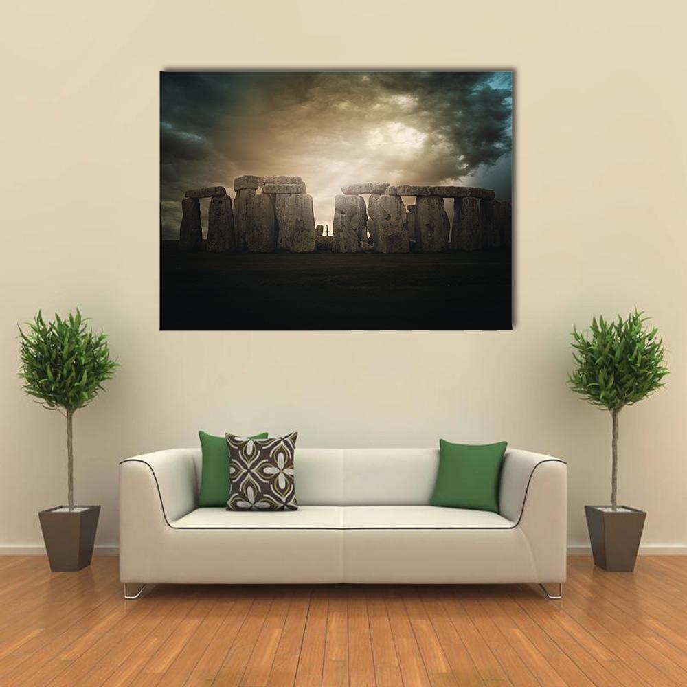Storm Clouds Over Stonehenge Canvas Wall Art in black, gray and beige, single panel hung on a wall