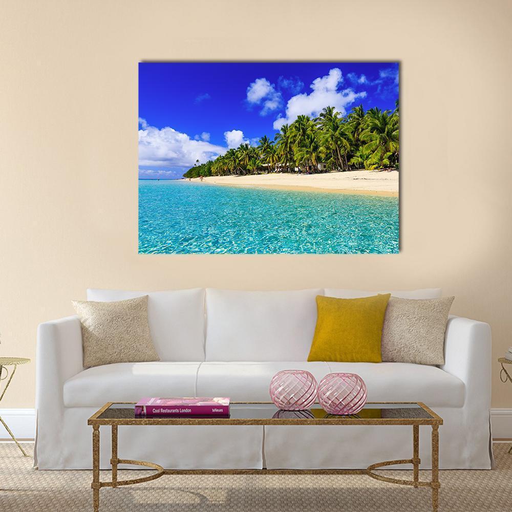 Tropical Beach at Dravuni Island Canvas Wall Art in beige, green and blue, single panel hung on a wall