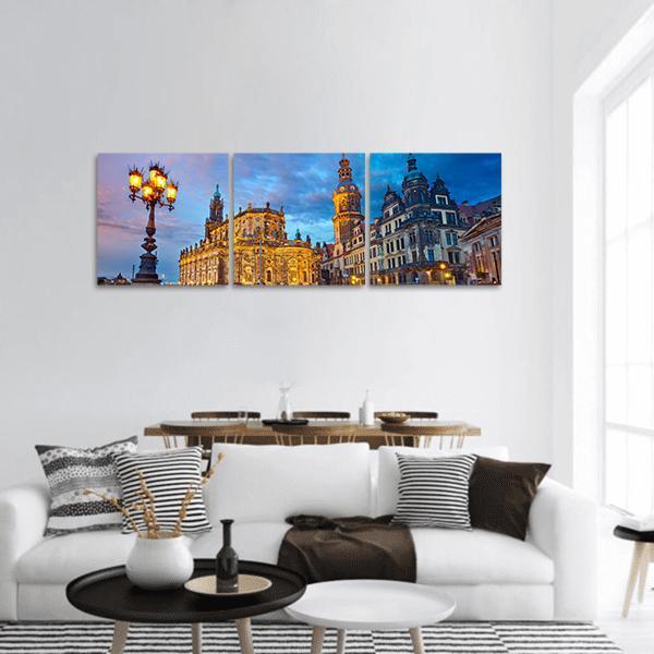 Dresden at Twilight Panoramic Canvas Wall Art in gold, yellow and blue, hung on a wall