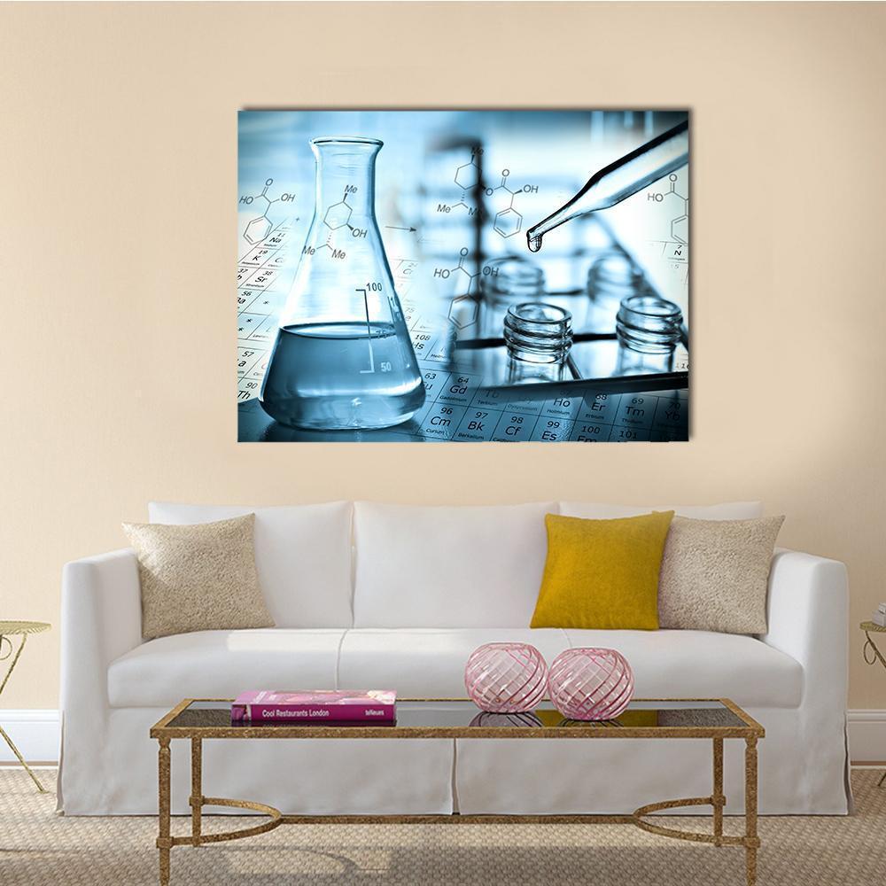 Laboratory Dropper Over Test Tube Canvas Wall Art in white and blue, single panel hung on a wall
